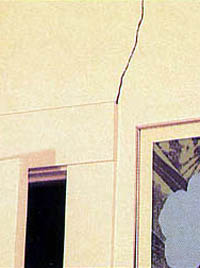 Sheetrock cracks over doors are the first warning sign of house leveling problems.