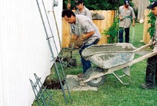 Pouring concrete for Foundation Repair in Austin