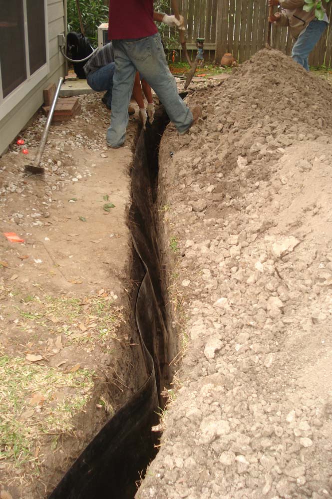 The Root Barricade in the Trench - Foundation Repair in Plano Texas