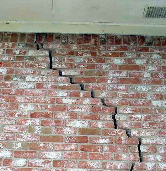 Exterior brick cracks shown in this photo are a clear indication of soil movement and the resulting foundation movement and damage.
