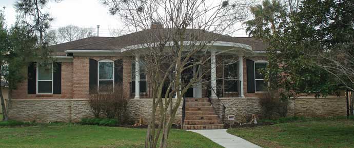 An attractive skirt is build around the perimeter of the house to conceal the concrete support columns under the house.