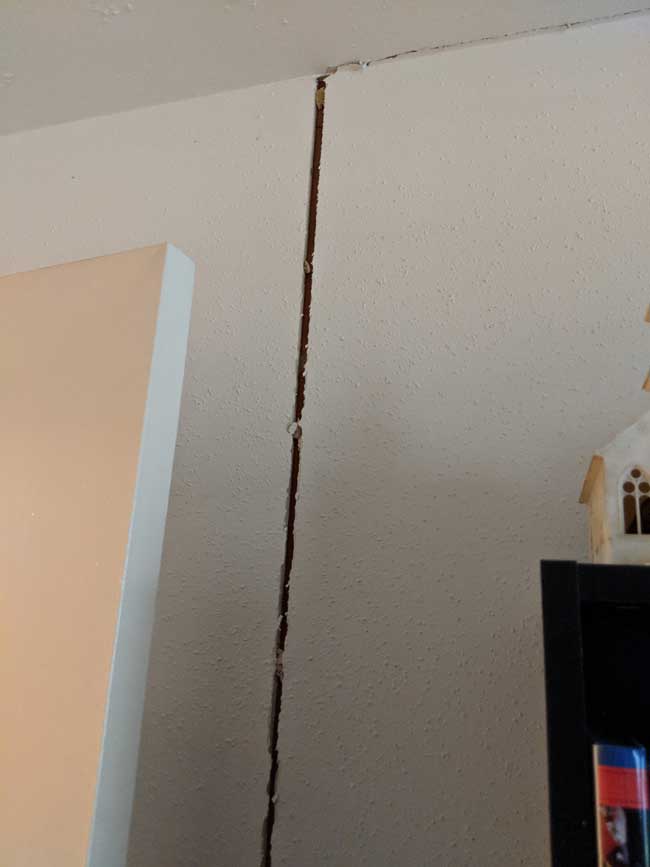 Vertical crack in sheetrock in a home in Sugar Land, Texas.