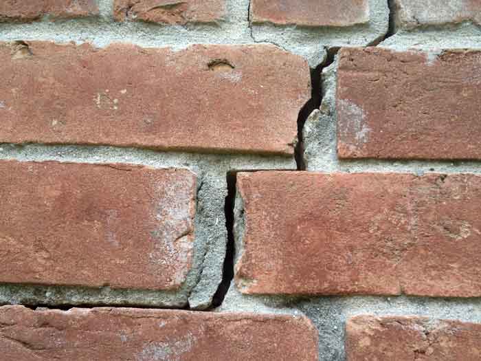 Exterior bricks cracked as shown in this Pearland house when the concrete slab foundation moved.