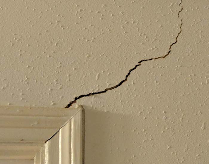 This Sugar Land area home has cracks in the door frame and sheetrock due to the movement of the concrete foundation slab.