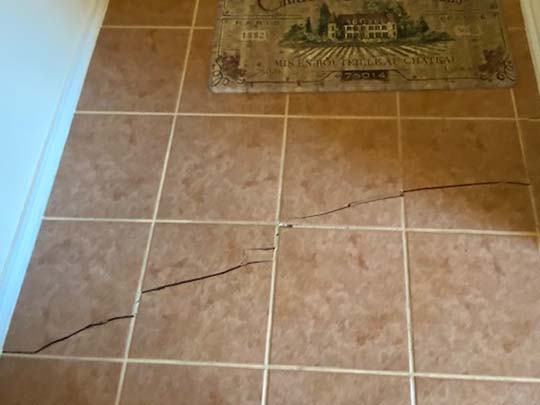 Tile floors can crack because of foundation movement